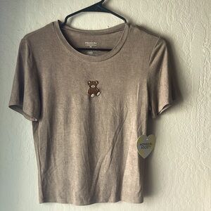 Brown shirt sleeve t-shirt with sewn in teddy bear in size xs.